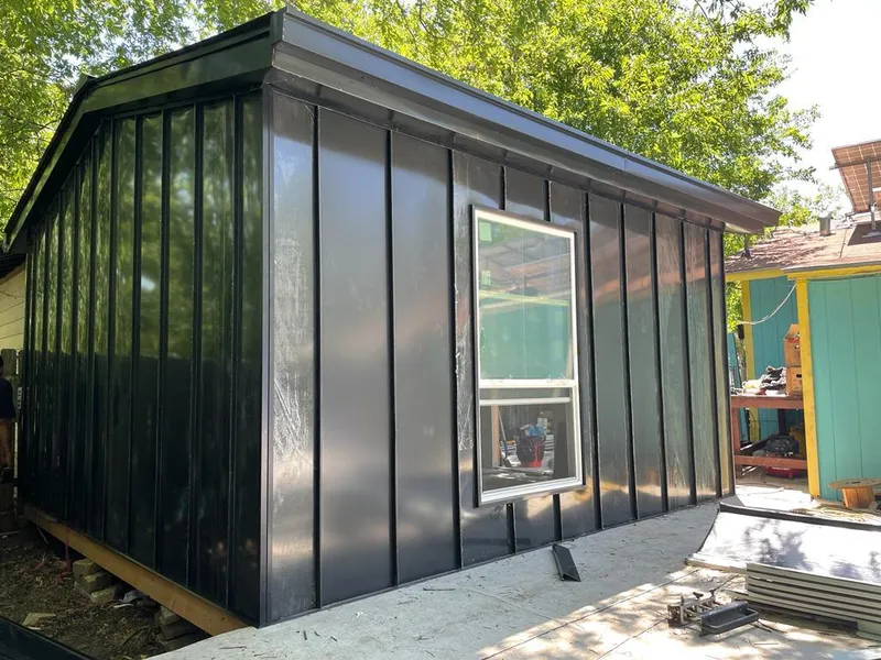 Black standing seam metal wall panels for Metal Roof Installation in Athol