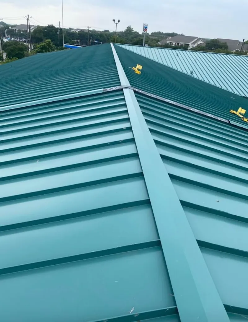 Green commercial metal roof ridge and valley for Metal Roof Repair in Athol