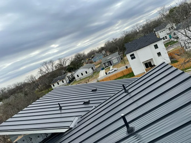 Standing seam metal roof panels with vents for Skylight Repair in Athol